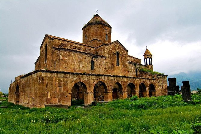 Private tour to UNESCO heritage Haghpat and Sanahin monasteries and Odzun church - Odzun Church in the Village: A Domed Basilica Seen From Afar